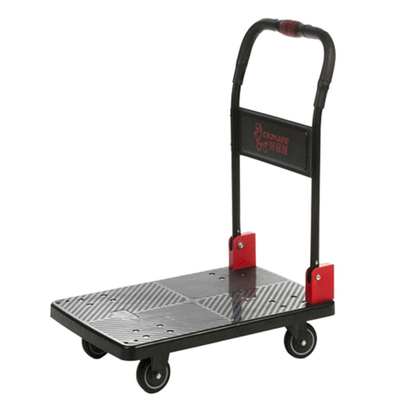 Une main pliant la plate-forme pliable SILENCIEUSE de polypropylène du chariot 180kg à chariot
